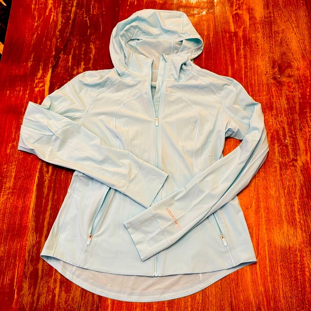 Lululemon running jacket, size 10, 4 way stretch. Never worn.